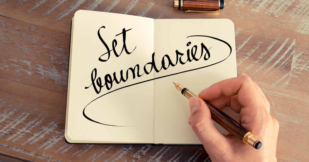 "Setting boundaries" is written in a notebook